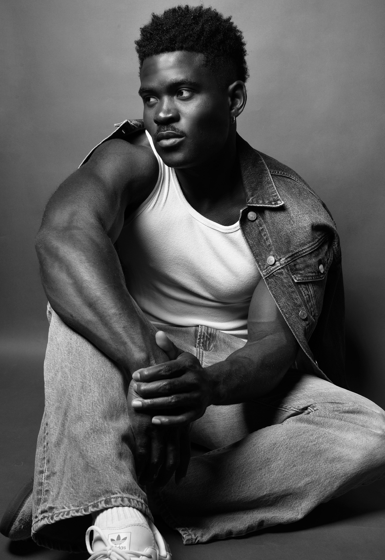 Joseph Foley — black & white seated editorial